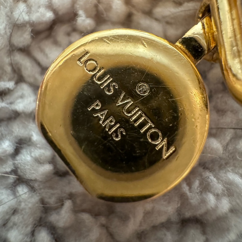 Louis Vuitton Gold-Tone Signature Charm Bracelet Accent